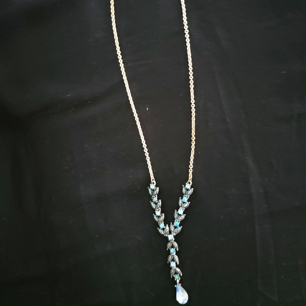 Blue and silvertone necklace.